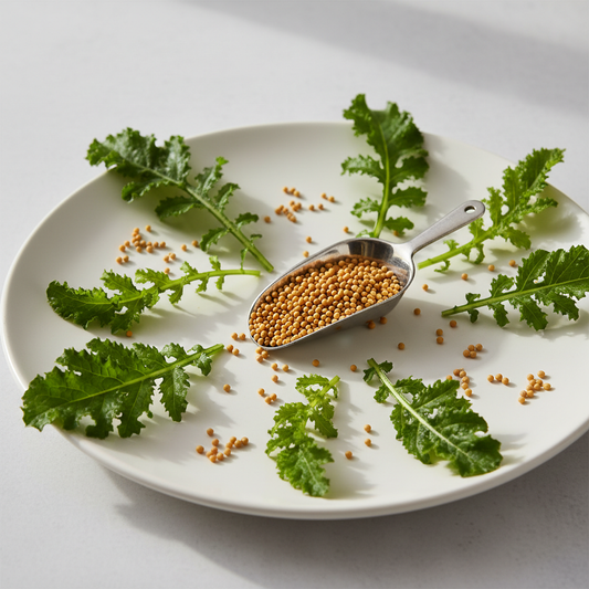 Fresh mustard sarson leaves and tiny yellow mustard seeds arranged on a clean white surface